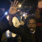 Rev. Sekou protesting in Ferguson